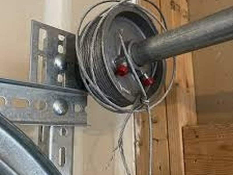 Garage Door Cable Repair work on a garage door